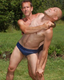 horny wrestlers fighting backyard woods undressed guys.jpg