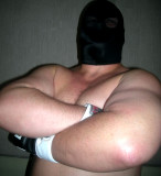 massively large pro wrestler arms crossed hot man.jpg