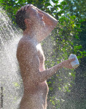 nudist club showering bathing naked man resort photos.jpg