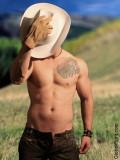 gay wrestling cowboys standing pasture field shirtless.jpg