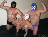 gay men grouped together wrestling roughhousing.jpg