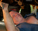 mechanic greasy working wearing overalls.jpg