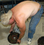 man bent over bending down working shirtless.jpg