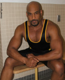 black dude big muscles goatee gay guy.jpg