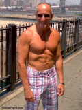 new york muscleman posing boardwalk docks.jpg