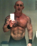 gay bodybuilder gym self pic mirror.jpg
