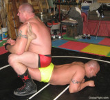 garage wrestling fighting hunky guys.jpg