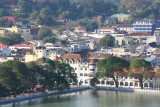 View of the lake with the city of Kandy in the background.