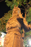 An imposing statue outside of the Gangaramaya (Vihara) Buddhist Temple.