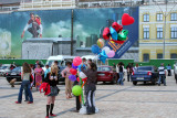Balloon vendor in the square in front of St. Michaels Cathedral (note the jeans billboard).