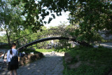 Hunch-backed wooden bridge at the Old Odessa in miniature park.