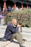A Chinese musician was demonstrating his talents.