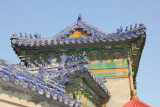 Details of the gates roofline with blue animals. Generally, the more animals there are, the more important the structure is.