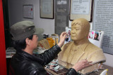 Another artisan making a life-like sculpture. For the right price, he would have made one of me!