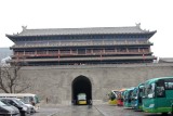 Tour buses outside of the wall. It was built by Zhu Yuanzhang, the first Emperor of the Ming Dynasty (1368-1644).