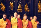 More monks praying.