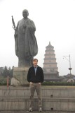 Me standing in front of the statue of Xuanzang and the Wild Goose Pagoda in Xian.