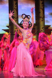 Radiant Chinese women in luscious pink Tang Dynasty costumes.