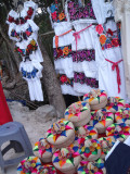 Mexican dresses and baskets for sale.