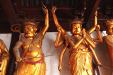 More golden Buddhist statues, on the western side of the Great Hall, including a hydra-armed Arhat.