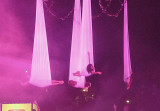 Slung inside the material were these weightless-looking women.