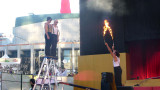 Acrobats who were contemplating jumping through the flaming hoop.
