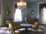 The parlor has several exquisite Federal-style mirrors.