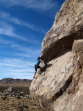 Taylor climbs SW-corner on Headstone Rock - 5.6 (Joshua Tree)