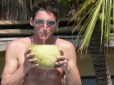 Norman sipped the sweet coconut milk