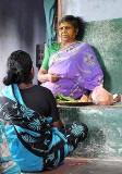 Diviner informing a client what the Gods foresee for her life. Tirunelveli District, Tamil Nadu.