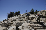 Starting to climb the narrow granite edge of Clouds Rest