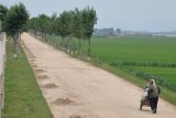 Saw pics of Nkorean countryside from decades ago. Nothing looks different. Wheelbarrows ox carts bicycles.