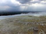 Pammukale with storm brewing. Calcium deposited by streams, looks like snow