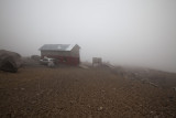 The hut in heavy cloud cover.