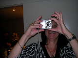 H taking a photo