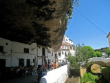 Restaurants under the overhanging cliffs