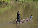 BOAT LOADED WITH WOOD FOR COOKING