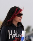 Red Bull and red hair highlights.