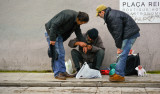 Three men and a watch, Barcelona, Spain, 2011