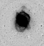 Helix Nebula Inverted image showing the extent of the nebulosity