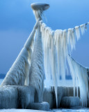 A surrealistic gigantic praying mantis of ice