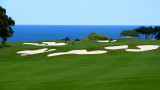 A golfers dream: The Pacific Ocean beside lush green fairways on sparsely populated courses