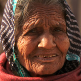 Patan old woman square.jpg