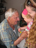 25 Dec 2010 Giving Grandpa Bert a flower