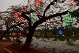 Along the shores of Hoan Kiem lake Hanoi.