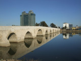 Old Roman Bridge built in the 2d century.  It is limited to walkers and motercyles now.  The Hilton is in the background.