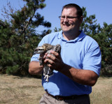 Scott Bleck gets to hold his bird on July 11.