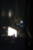sunshine dances on the cupboard door