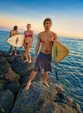 Waikiki surfers at sunset