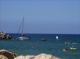 Boats and yachts entering Herzliya Marina on a winters day.jpg